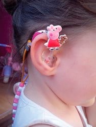 Hearing aid decorated with Peppa Pig
