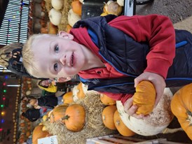 Boy with pumpkins