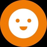 White face smile emoji on an orange background